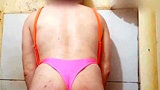 Carolcross posing in a thong bikini