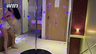 young dancer twerks on pole with naughty face and tiny white pussy