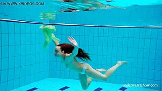 Nina Mohnatka shows off her small perky breasts and hairy vagina