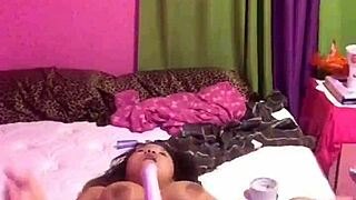 Beautiful black beauty Whorella Deville's solo pleasure with a wand massage.