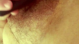 a hot amateur moans while masturbating her natural tits at home