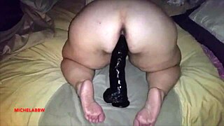 Hey, watch me stroke this massive dildo like a real beast!