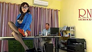 Whoa, this giant secretary just sat on my desk, shocking me with her height!