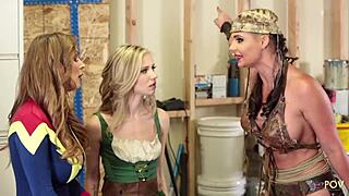 cosplaying lesbians seduce the new blonde into a threesome with ass licking and scissoring