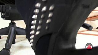 She dangles her sexy shoes seductively in a close-up solo fetish scene. Her feet tease in pantyhose.