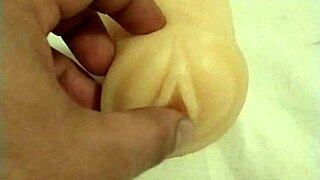 i'm playin with this artificial pussy, fingerin my ass and tits, oh god.