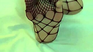 cumming on the brunette's feet in this feet cum scene