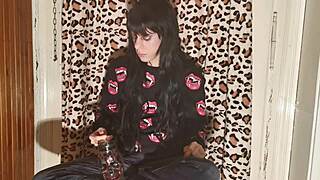 smoking goth girl relaxes behind the scenes after a long day