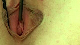 Small boobed redhead gets an orgasm with the help of a sex toy