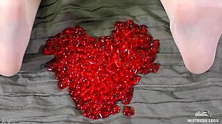 i'm playing with my nylon feet, teasing with red hearts for valentine's, goddess style