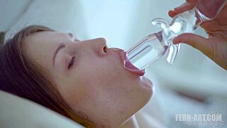 Man, these real lesbians kiss and toy with glass dildos!