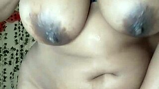 Spitting on my big ebony tits