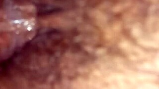 close-up footage of a mature individual in a wet setting