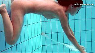 Nata Shows Tits While Swimming Underwater In Public Shower.