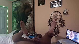 Naejae rubs her wet pussy watching lesbian porn