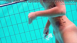 Nata Shows Tits While Swimming Underwater In Public Shower.