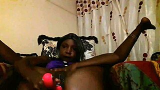 In this homemade scene, the ebony amateur digs deep with a dildo, leading to a juicy squirting orgasm