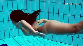 Nata, the hot Hungarian girl swims in the sea.
