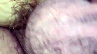 She's bent over, big pussy lips spread for deep assfucking in doggystyle.