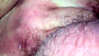 She's bent over, big pussy lips spread for deep assfucking in doggystyle.