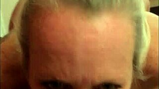 check out this mature milf with huge tits and ass sucking big black cocks and getting facials