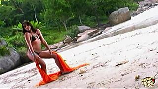 Pretty brunette has hot anal sex on the beach