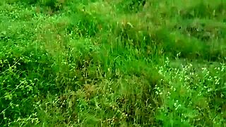 Indian aunty enjoys outdoor fun on the second floor step.