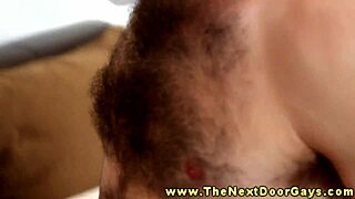 Hairy muscular dude being dicksucked by athletic gay bodybuilder