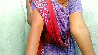 Indian aunty enjoys outdoor fun on the second floor step.