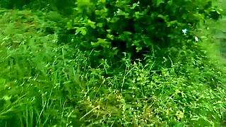 Indian aunty enjoys outdoor fun on the second floor step.