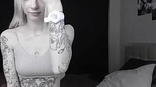 does this pale slim tattoo camgirl flash her shaved pussy and squirt on cam?