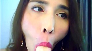 shemale babe in red stroking her big shaft on webcam