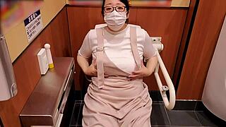 japanese milf masturbates in store toilet, want to watch her big tits?