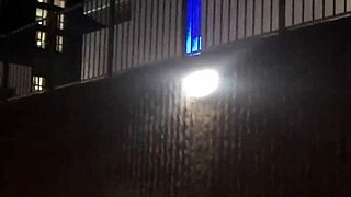 Chubby lady in miniskirt enjoys attention.