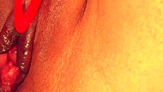 Her shaved pussy pulses during a powerful orgasm.