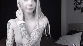 does this pale slim tattoo camgirl flash her shaved pussy and squirt on cam?