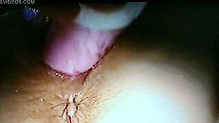 blindfolded wife gets fucked with rabbit dildo, cumming hard.