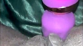 milaj, a chubby black bbw with big tits, tests a new wand vibrator on her pussy and clit in close-up