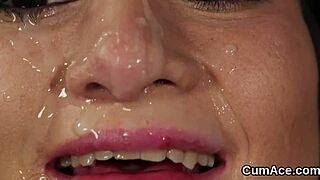 Hey, check out this unusual model getting a massive cumshot on her face while sucking all that creamy load in a wild blowbang bukkake session! 😏💦