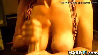 busty wife giving homemade handjob to husband