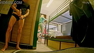 Public shower scene in a hostel with a European twist