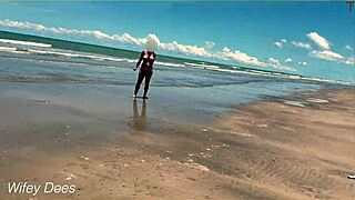 Wife dares to strip nude for public beach football game.