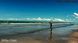 Wife dares to strip nude for public beach football game.