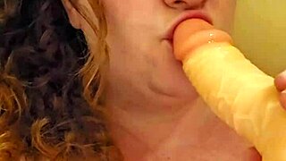 can you see in her eyes how this chubby redhead loves deepthroating cock?