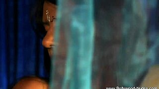 Bolly babe strips slow, teasing with every move in erotic dance