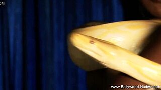 Bolly babe strips slow, teasing with every move in erotic dance