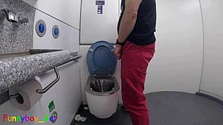 I piss then jerk my hot cock in train toilet