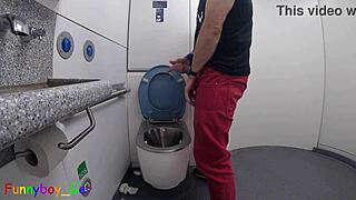 I piss then jerk my hot cock in train toilet