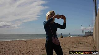 beautiful blonde teen toys with big black dick on sunny beach. she loves sucking it hard