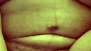 rea performing masked masturbation with dildo in pussy and sucking on it